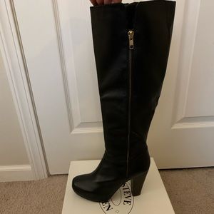 Rikki black leather heeled boot by Steve Madden